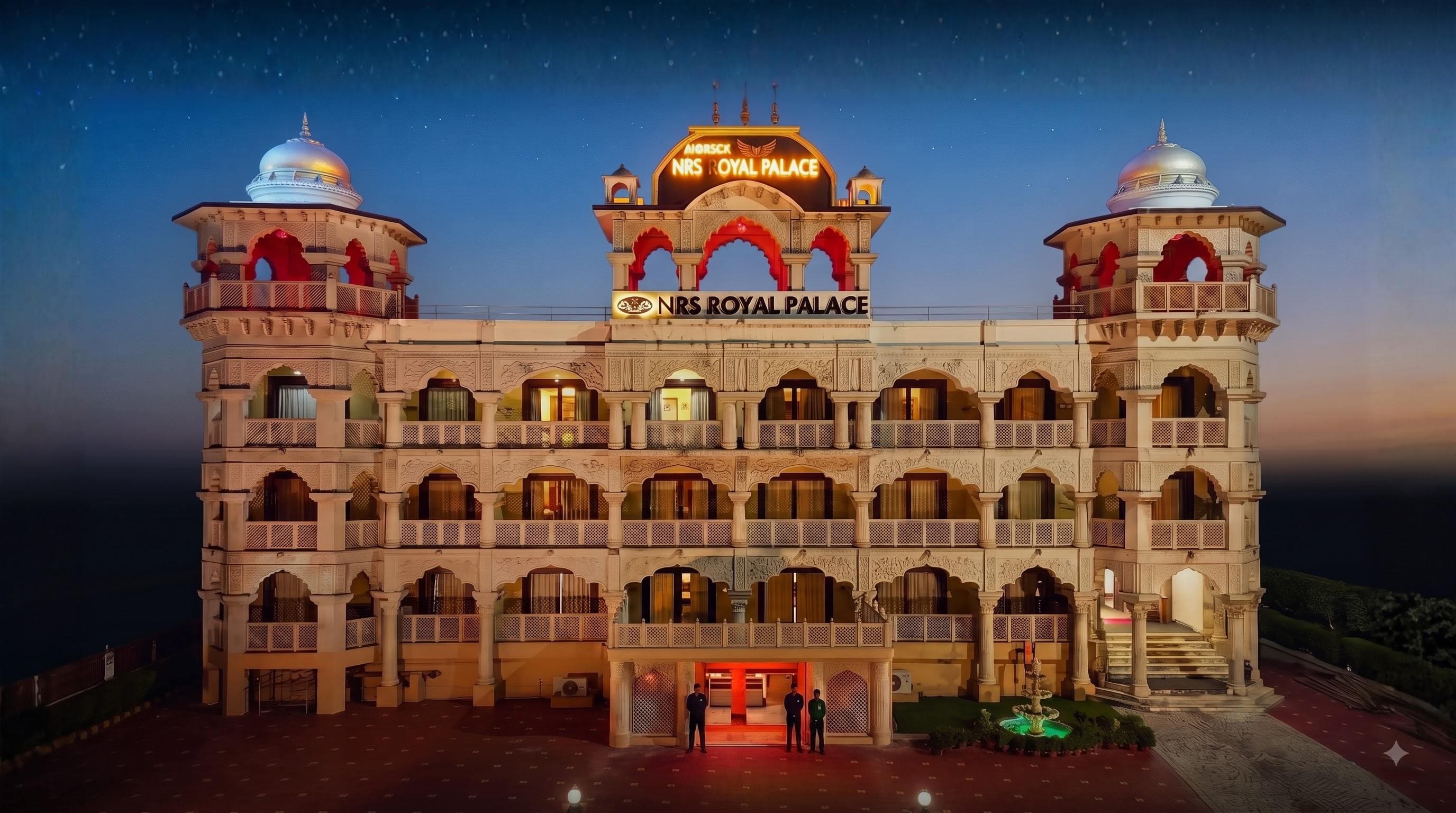 NRS Royal Palace lit facade at dusk